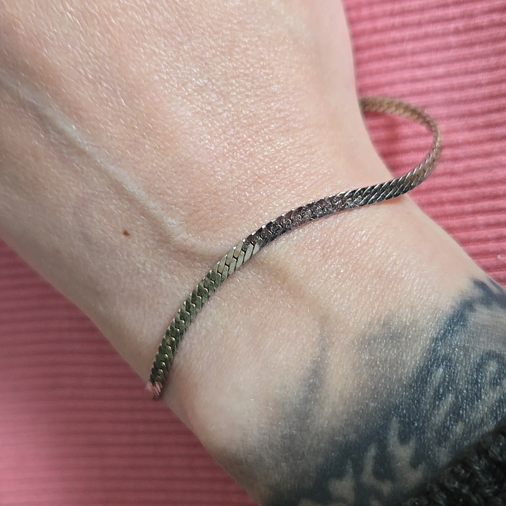 Silver toned snake rope bracelet